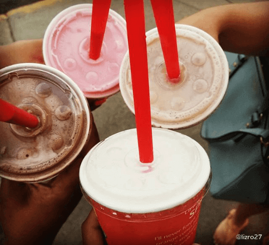 Sharing a famous Fribble(R) milkshake with your favorite family members.